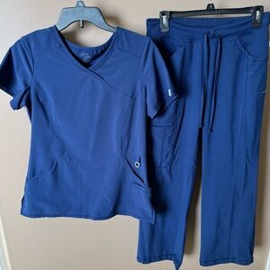 Cherokee Infinity scrubs navy blue S top, SP pants. Gently used. $20.
